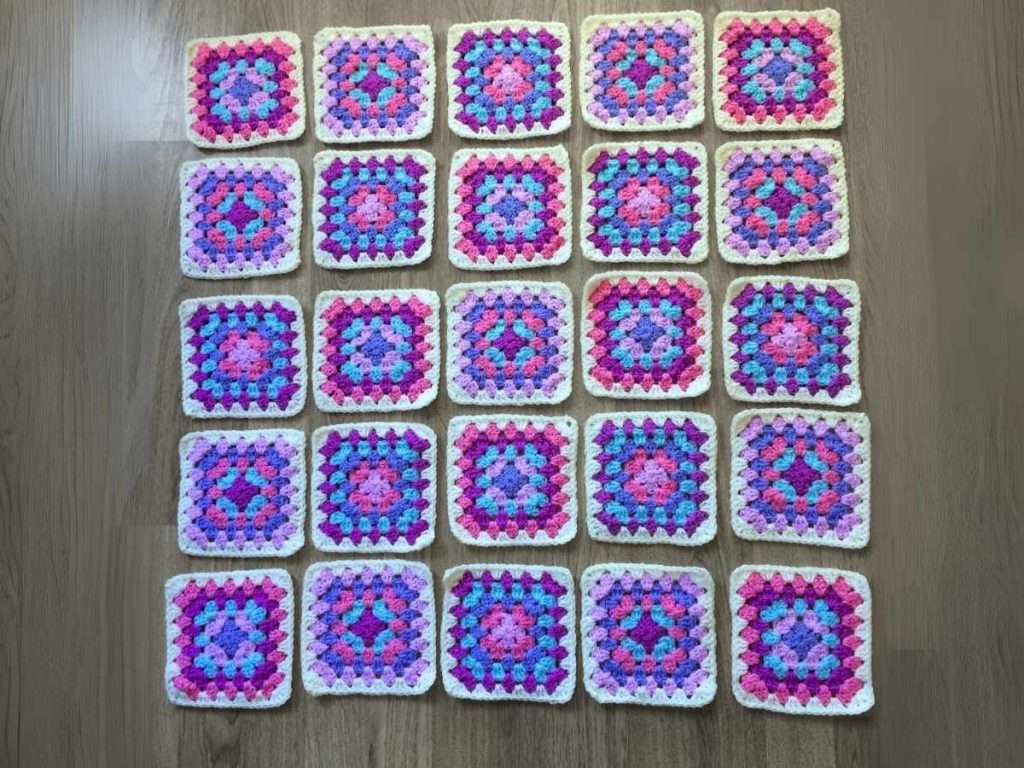 Arrangement of 25 Granny Squares ready for joining.