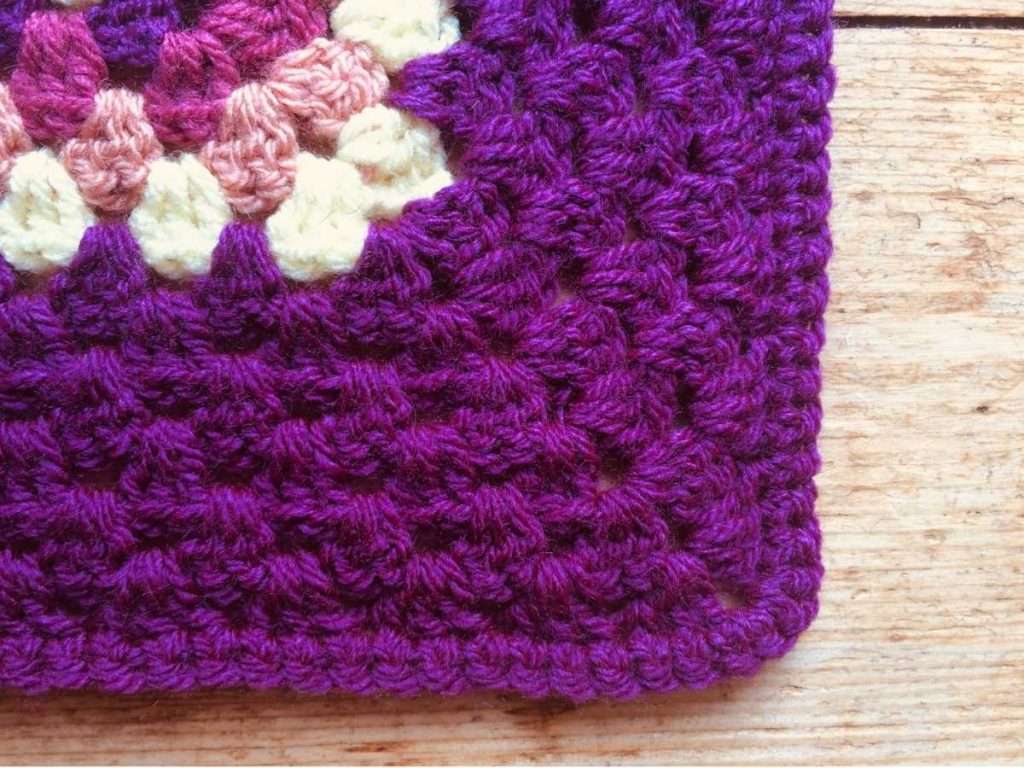 Close up of the granny stitch border of the Summer Fruits Throw