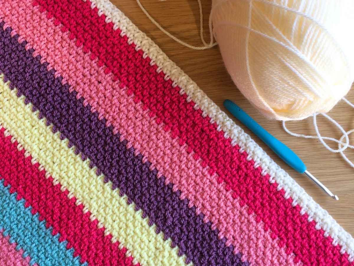 Corner to Corner moss stitch blanket