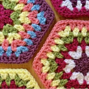 Close up of four different granny hexagons