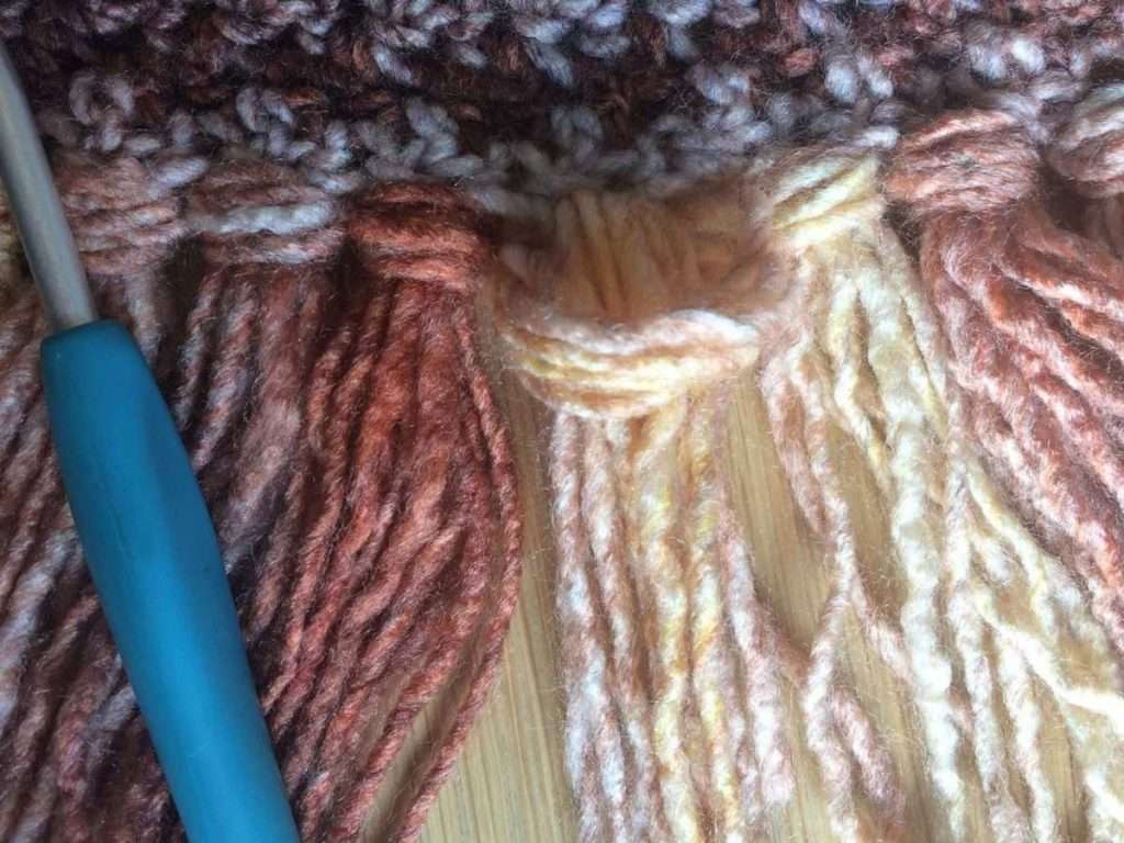 Adding tassels to a scarf