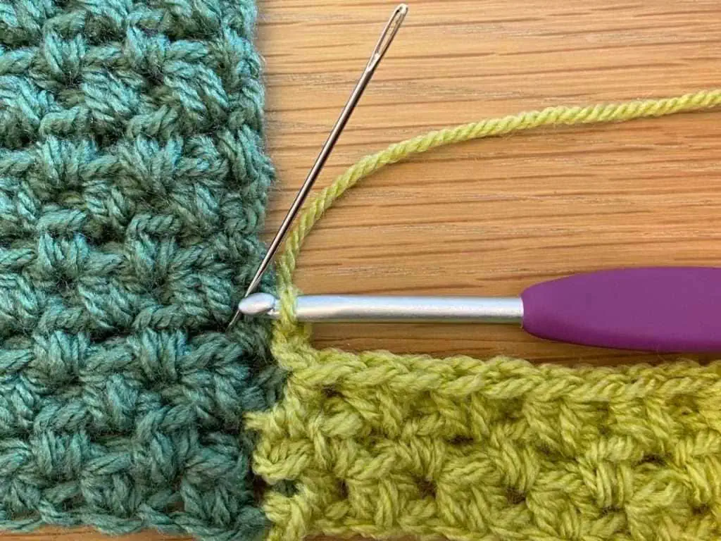Needle showing placement of the next crochet hook