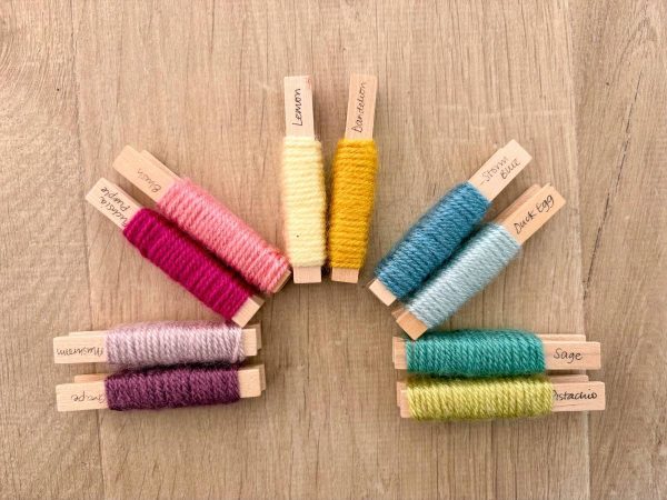 Yarn pegs with colours used for the project